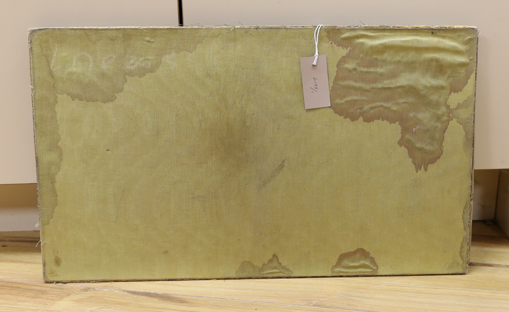 A desk blotter composed of 17th/18th century fabrics, 35x60cm